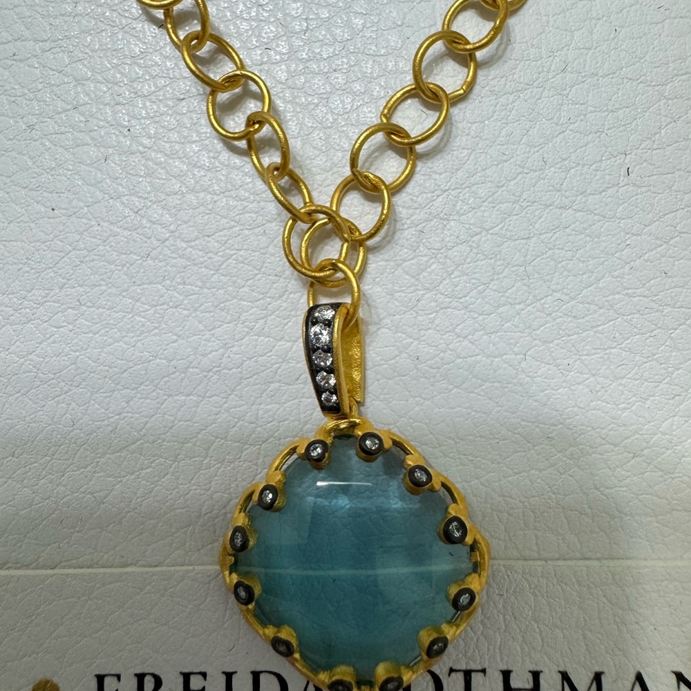 NWOT Freida Rothman Gold and Blue Gem Necklace in original wrapping